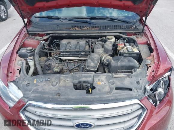 2014 Ford Taurus SEL z VIN 1FAHP2E82EG157445, wystawiony jako IAAI lot #42133676 z przebiegiem 174 616 mil mil oraz . Historia ofert i sprzedaży dostępna na DreamBid. Obrazek 10.