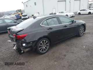 2015 Acura TLX V6 Advance with VIN 19UUB3F76FA002163, listed as a IAAI auction lot 41460668 with 110,095 mi miles. Bid and sale history available at carsss.com. Image 4.