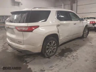 2018 Chevrolet Traverse Premier with VIN 1GNEVJKW2JJ103924, listed as a IAAI auction lot 41576128 with 128,694 mi miles. Bid and sale history available at carsss.com. Image 4.