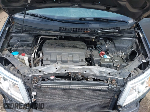 2012 Honda Odyssey EX-L with VIN 5FNRL5H67CB041252, listed as a IAAI auction lot 42158494 with 152,940 mi miles and . Bid and sale history available at DreamBid. Image 10.