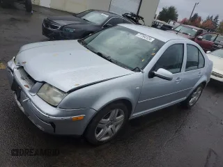 2004 Volkswagen Jetta GL with VIN 3VWRK69M54M030184, listed as a Copart auction lot 77764124 with 97,634 mi miles and Salvage title. Bid and sale history available at DreamBid. Image 1.
