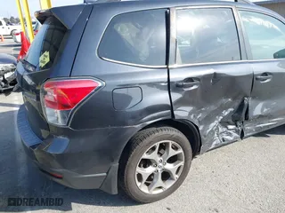 2018 Subaru Forester Touring with VIN JF2SJAWC7JH441559, listed as a IAAI auction lot 41599025 with 105,828 mi miles. Bid and sale history available at carsss.com. Image 6.