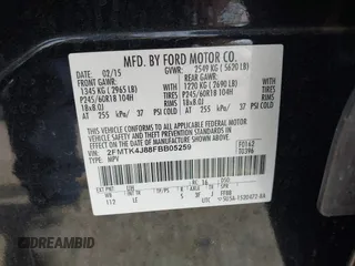 2015 Ford Edge SEL with VIN 2FMTK4J88FBB05259, listed as a IAAI auction lot 42043247 with 128,987 mi miles. Bid and sale history available at carsss.com. Image 9.