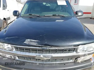 2004 Chevrolet Suburban LT z VIN 3GNFK16T44G206586, wystawiony jako IAAI lot #41480840 z przebiegiem Nie podano mil oraz . Historia ofert i sprzedaży dostępna na DreamBid. Obrazek 6.