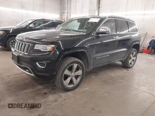 2014 Jeep Grand Cherokee Overland with VIN 1C4RJFCG8EC177899, listed as a IAAI auction lot 41695290 with 200,867 mi miles and . Bid and sale history available at DreamBid. Image 20.