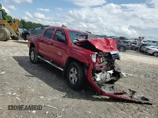 2015 Toyota Tacoma with VIN 3TMLU4EN9FM165421, listed as a Copart auction lot 58547985 with 136,372 mi miles and Salvage title. Bid and sale history available at DreamBid. Image 14.