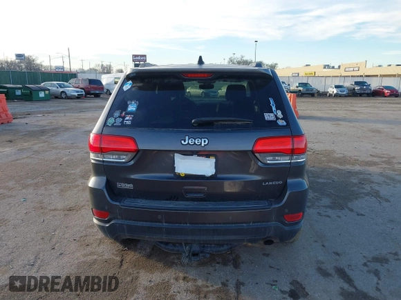 2019 Jeep Grand Cherokee Altitude with VIN 1C4RJEAG2KC698822, listed as a IAAI auction lot 41476562 with 128,035 mi miles and . Bid and sale history available at DreamBid. Image 16.