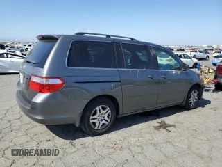 2007 Honda Odyssey EX-L z VIN 5FNRL38677B424117, wystawiony jako Copart lot #58814235 z przebiegiem 188 908 mil mil oraz Szkoda całkowita • Salvage title. Historia ofert i sprzedaży dostępna na DreamBid. Obrazek 3.