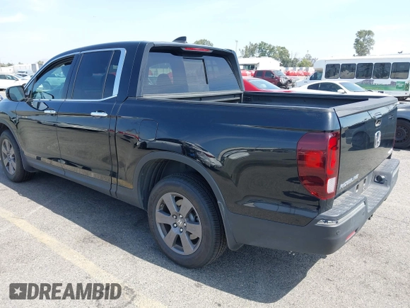 2020 Honda Ridgeline RTL-E with VIN 5FPYK3F70LB009376, listed as a IAAI auction lot 42488529 with 30,932 mi miles and . Bid and sale history available at DreamBid. Image 3.