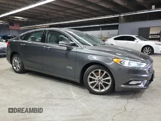 2017 Ford Fusion Titanium z VIN 3FA6P0SU3HR209563, wystawiony jako Copart lot #52039915 z przebiegiem 119 961 mil mil oraz Szkoda całkowita • Salvage title. Historia ofert i sprzedaży dostępna na DreamBid. Obrazek 4.