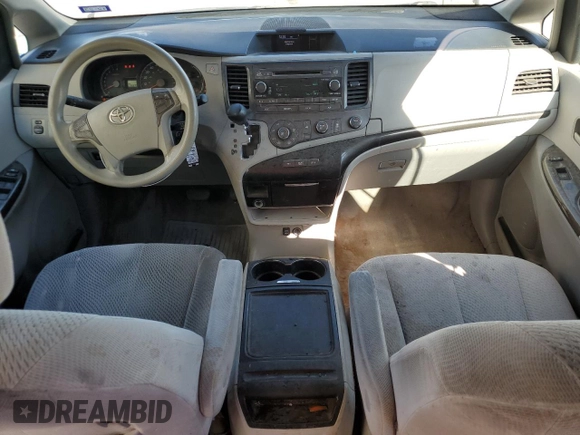2012 Toyota Sienna LE AAS with VIN 5TDKK3DC8CS259085, listed as a Copart auction lot 73592584 with 198,370 mi miles and Salvage Title. Bid and sale history available at DreamBid. Image 8.