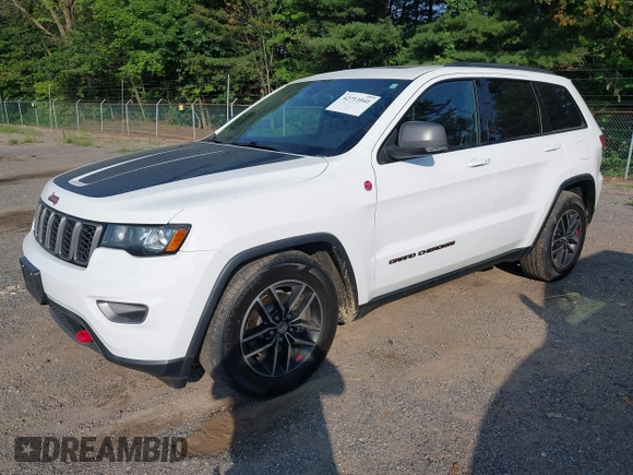 2017 Jeep Grand Cherokee Trailhawk with VIN 1C4RJFLG2HC670868, listed as a IAAI auction lot 42711041 with 129,465 mi miles and . Bid and sale history available at DreamBid. Image 19.