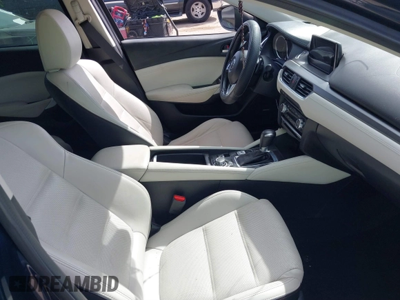 2016 Mazda 6 i Grand Touring with VIN JM1GJ1W59G1439075, listed as a IAAI auction lot 41792755 with 99,215 mi miles and . Bid and sale history available at DreamBid. Image 5.