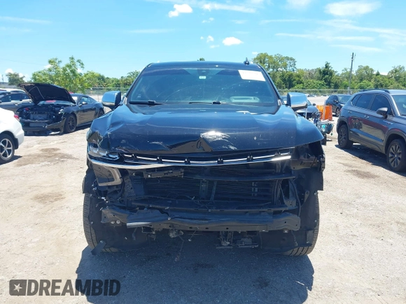 2021 Chevrolet Tahoe Premier with VIN 1GNSKSKDXMR195984, listed as a IAAI auction lot 42528305 with 89,925 mi miles and . Bid and sale history available at DreamBid. Image 13.