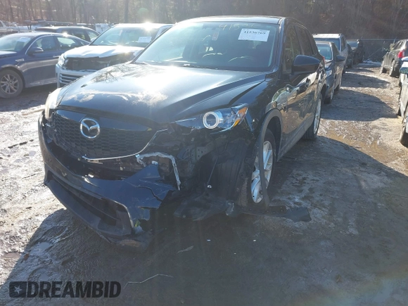 2014 Mazda CX-5 Grand Touring with VIN JM3KE4DY1E0303658, listed as a IAAI auction lot 41536769 with 158,777 mi miles. Bid and sale history available at carsss.com. Image 6.