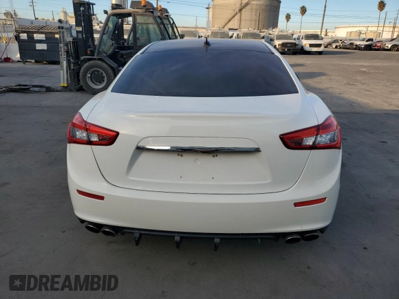2014 Maserati Ghibli z VIN ZAM57XSA6E1097525, wystawiony jako Copart lot #42029695 z przebiegiem 93 740 mil mil oraz Szkoda całkowita • Salvage title. Historia ofert i sprzedaży dostępna na DreamBid. Obrazek 6.