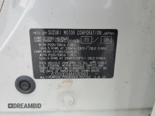 2010 Suzuki Grand Vitara Premium z VIN JS3TD0D24A4100983, wystawiony jako Copart lot #60311295 z przebiegiem 104 455 mil mil oraz Szkoda całkowita • Salvage title. Historia ofert i sprzedaży dostępna na DreamBid. Obrazek 13.