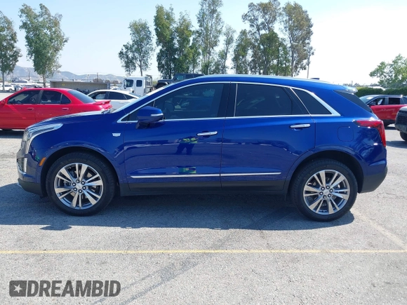 2023 Cadillac XT5 FWD Premium Luxury z VIN 1GYKNCRS3PZ176654, wystawiony jako IAAI lot #42136259 z przebiegiem 20 403 mil mil oraz . Historia ofert i sprzedaży dostępna na DreamBid. Obrazek 15.