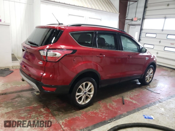 2017 Ford Escape SE with VIN 1FMCU9GD8HUE44757, listed as a Copart auction lot 47301735 with 122,429 mi miles and Clean Title. Bid and sale history available at DreamBid. Image 3.