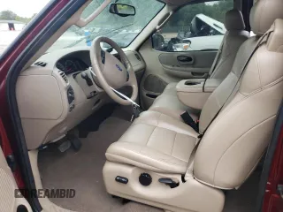 2003 Ford F-150 XL with VIN 1FTRX07L73KC07352, listed as a Copart auction lot 64639214 with 108,003 mi miles and Salvage title. Bid and sale history available at DreamBid. Image 7.