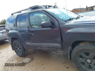 2014 Nissan Xterra X with VIN 5N1AN0NW4EN813172, listed as a IAAI auction lot 42010220 with 185,971 mi miles and . Bid and sale history available at carsss.com. Image 13.