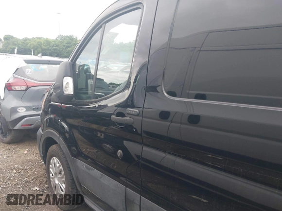 2020 Ford Transit Cargo with VIN 1FTYE1Y80LKB76611, listed as a IAAI auction lot 42445263 with 104,540 mi miles and . Bid and sale history available at DreamBid. Image 14.
