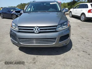 2012 Volkswagen Touareg Sport with VIN WVGEF9BP0CD010197, listed as a Copart auction lot 48480355 with 131,605 mi miles and Salvage Title. Bid and sale history available at DreamBid. Image 5.