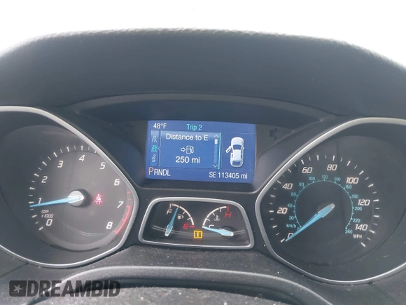 2014 Ford Focus SE z VIN 1FADP3K23EL162634, wystawiony jako IAAI lot #41772913 z przebiegiem 113 405 mil mil oraz . Historia ofert i sprzedaży dostępna na DreamBid. Obrazek 7.