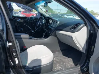2014 Kia Optima LX with VIN 5XXGM4A76EG346193, listed as a IAAI auction lot 42176760 with 124,702 mi miles and . Bid and sale history available at DreamBid. Image 5.