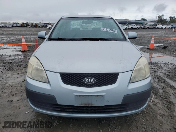 2009 Kia Rio LX with VIN KNADE223396443465, listed as a Copart auction lot 51370975 with 110,952 mi miles and Salvage Title. Bid and sale history available at carsss.com. Image 5.