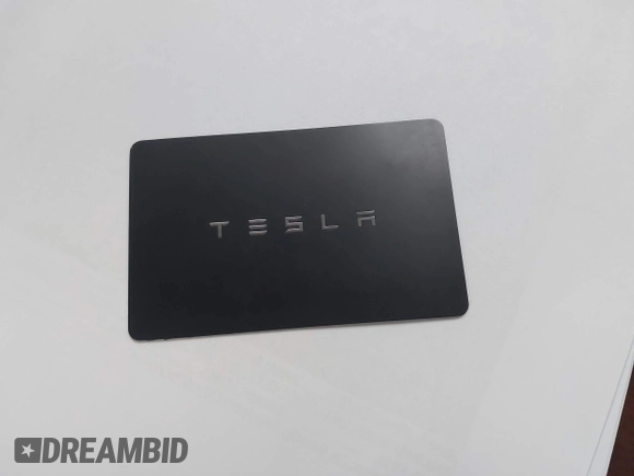 2020 Tesla Model 3 Standard Range Plus z VIN 5YJ3E1EA6LF703159, wystawiony jako IAAI lot #42099718 z przebiegiem 30 175 mil mil oraz . Historia ofert i sprzedaży dostępna na DreamBid. Obrazek 11.
