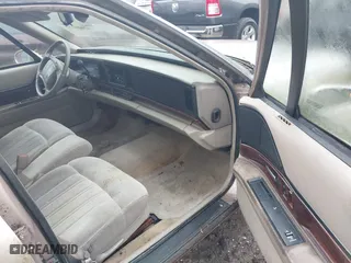 1999 Buick LeSabre Custom with VIN 1G4HP52K5XH476665, listed as a IAAI auction lot 42008177 with 34,279 mi miles. Bid and sale history available at carsss.com. Image 5.