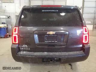 2018 Chevrolet Tahoe LS with VIN 1GNSKAKC0JR258071, listed as a Copart auction lot 49054535 with 136,406 mi miles and Salvage Title. Bid and sale history available at carsss.com. Image 6.