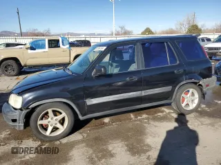 2001 Honda CR-V LX with VIN JHLRD17431S012565, listed as a Copart auction lot 84760154 with 197,788 mi miles and Salvage Title. Bid and sale history available at carsss.com. Image 1.