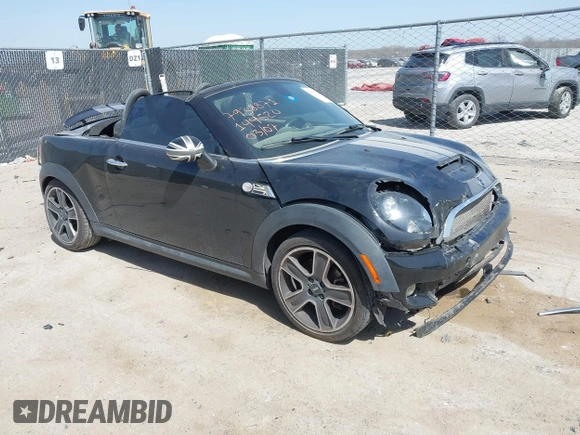 2012 MINI Roadster S with VIN WMWSY3C56CT144520, listed as a IAAI auction lot 41818205 with 86,836 mi miles and . Bid and sale history available at DreamBid. Image 1.