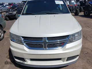2014 Dodge Journey SE with VIN 3C4PDCAB4ET119412, listed as a IAAI auction lot 41760074 with 148,882 mi miles. Bid and sale history available at carsss.com. Image 6.