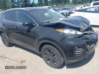 2018 Kia Sportage LX with VIN KNDPMCAC6J7462438, listed as a IAAI auction lot 42855351 with 101,897 mi miles and . Bid and sale history available at DreamBid. Image 1.