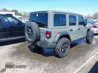 2022 Jeep Wrangler Unlimited Sport S with VIN 1C4HJXDG1NW200793, listed as a IAAI auction lot 41810817 with 35,212 mi miles. Bid and sale history available at carsss.com. Image 4.