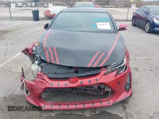 2016 Scion tC with VIN JTKJF5C74GJ026588, listed as a IAAI auction lot 41582253 with 74,023 mi miles. Bid and sale history available at carsss.com. Image 12.