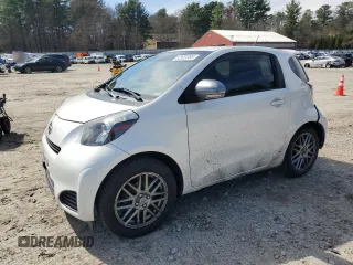 2012 Scion iQ with VIN JTNJJXB03CJ011933, listed as a Copart auction lot 52923385 with 137,836 mi miles and Clean Title. Bid and sale history available at carsss.com. Image 1.
