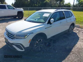 2022 Volkswagen Tiguan S with VIN 3VV0B7AX1NM099058, listed as a IAAI auction lot 41771674 with 49,789 mi miles. Bid and sale history available at carsss.com. Image 2.