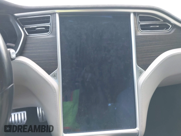 2014 Tesla Model S P85D with VIN 5YJSA1H29EFP63032, listed as a IAAI auction lot 42132145 with Not Provided miles and . Bid and sale history available at DreamBid. Image 7.