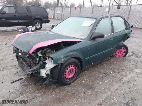 1999 Honda Civic VP with VIN 2HGEJ6610XH536119, listed as a IAAI auction lot 41524332 with 160,471 mi miles. Bid and sale history available at carsss.com. Image 2.