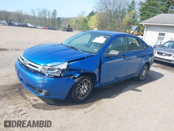 2010 Ford Focus SE with VIN 1FAHP3FNXAW159048, listed as a IAAI auction lot 42103062 with 142,810 mi miles. Bid and sale history available at carsss.com. Image 2.