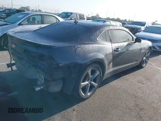 2014 Chevrolet Camaro LT z VIN 2G1FB1E35E9126793, wystawiony jako IAAI lot #41959896 z przebiegiem Nie podano mil oraz . Historia ofert i sprzedaży dostępna na DreamBid. Obrazek 4.