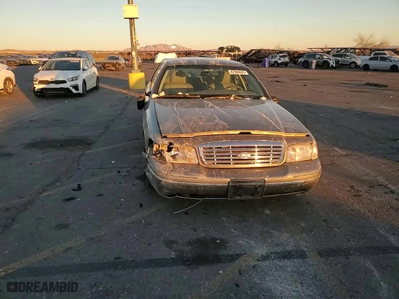 2004 Ford Crown Victoria LX with VIN 2FAFP74W04X131780, listed as a Copart auction lot 87894645 with 86,559 mi miles and Salvage Title. Bid and sale history available at carsss.com. Image 11.