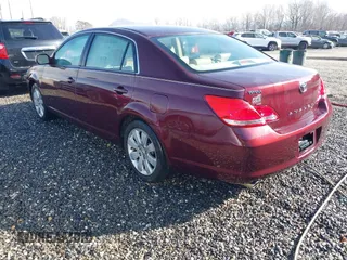 2006 Toyota Avalon XL with VIN 4T1BK36B86U105590, listed as a IAAI auction lot 41412859 with 134,670 mi miles. Bid and sale history available at carsss.com. Image 3.