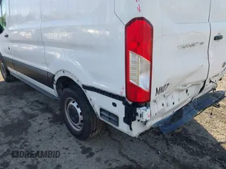 2021 Ford Transit Cargo z VIN 1FTYE1Y89MKA16809, wystawiony jako IAAI lot #41643195 z przebiegiem 7 407 mil mil oraz . Historia ofert i sprzedaży dostępna na DreamBid. Obrazek 17.