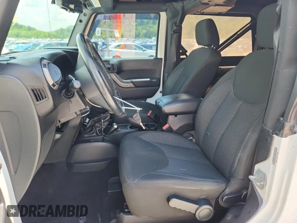 2016 Jeep Wrangler Black Bear with VIN 1C4AJWAG5GL151537, listed as a Copart auction lot 62665455 with 93,537 mi miles and Salvage title. Bid and sale history available at DreamBid. Image 7.