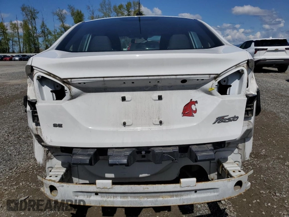 2018 Ford Fiesta SE z VIN 3FADP4BJ7JM114172, wystawiony jako Copart lot #54014805 z przebiegiem 66 828 mil mil oraz Szkoda całkowita • Salvage title. Historia ofert i sprzedaży dostępna na DreamBid. Obrazek 6.